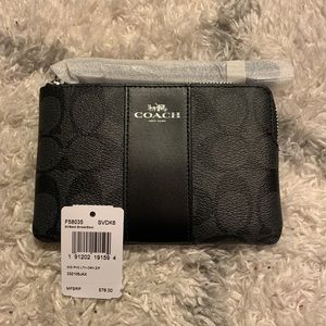 Coach Corner Zip Wristlet In Signature Canvas